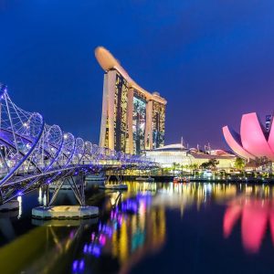 Marina Bay Skyline and Helix Bridge landmark at twilight in Singapore